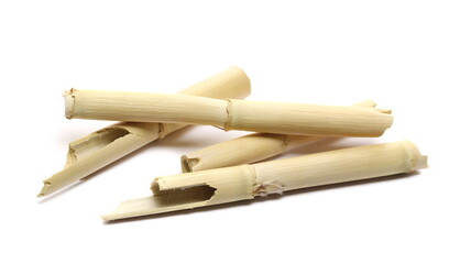 Broken bamboo sticks pile isolated on white background