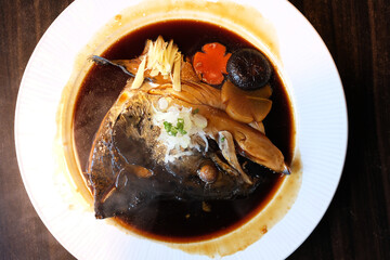 Steam salmon fish head with soy sauce. Japanese food.