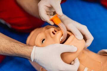 Top view of detail of a training dummy with a nasogastric (NG) tube. Healthcare and education concept.
