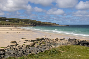 ST IVES, CORNWALL, UK - MAY 13 : View of Porthmeor beach at St Ives, Cornwall on May 13, 2021. One unidentified person