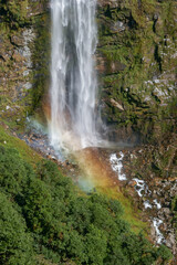 Beautiful rainbow colors at roadside waterfall in Thrumshingla national park, Mongar district, eastern Bhutan