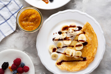 Pancakes Day breakfast crepes with banana