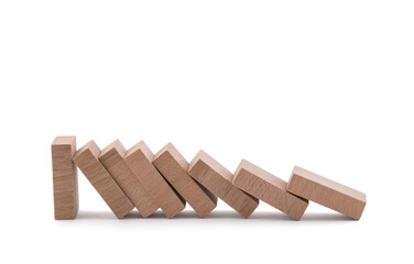 The domino effect stopped by a unique, one strong piece isolated on white with clipping path