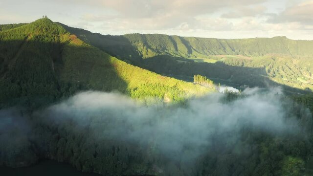 Miradouro do Cerrado das Freiras, Sao Miguel, Azores, Portugal. Stunning landscapes with vibrant vegetation and beautiful lake. Drone footage over the volcanic island. High quality 4k footage