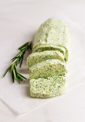 Homemade butter with herbs and rosemary for sandwiches and steak sliced