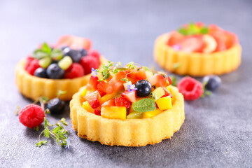 assorted of fresh fruit tart in plate