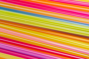 Obraz premium Drinking straws for party on blue pastel background with copy space. Top view for design