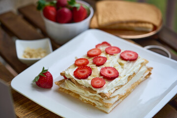 Homemade meringue Keto cake with strawberries. High quality photo