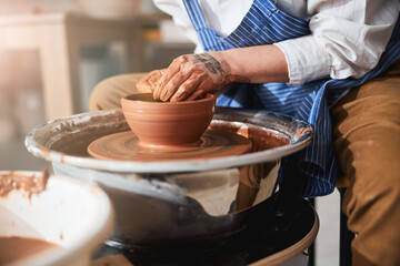 Fototapeta na wymiar Close up of professional master molding new pot