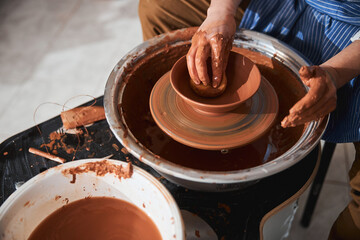 Focused photo on master molding clay bowl