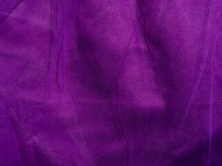 Purple tulle fabric texture top view. Violet background. Fashion trendy color feminine tutu skirt dress flat lay, female blog glossy backdrop text sign design. Girly abstract wallpaper,textile surface