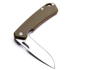 A small folding hunting knife isolated on the white background. Photo taken under soft artificial light.