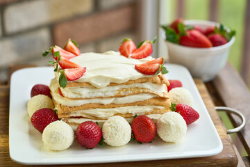 Homemade meringue Keto cake with strawberries. High quality photo