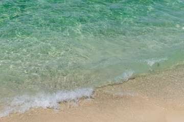 Fototapeta na wymiar crystal clear sea water on the beach