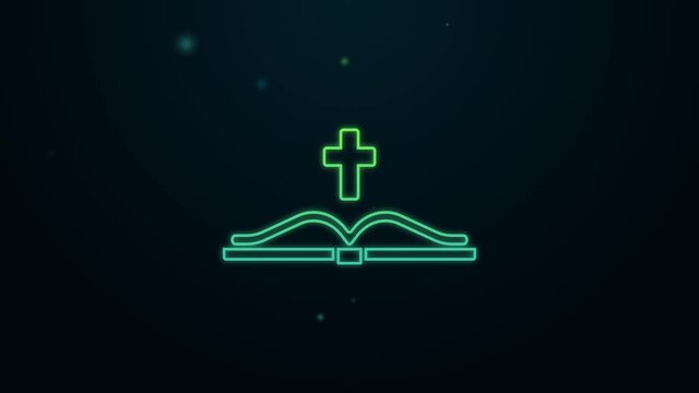 Glowing neon line Holy bible book icon isolated on black background. 4K Video motion graphic animation