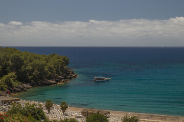 Fototapeta premium ship in the sea near the shore