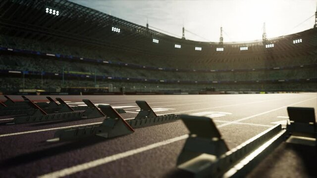 Sport outdoor athletics arena with start blocks on the runway. Stadium in the sunlight. High quality 4k footage