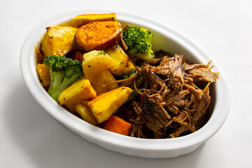 Butterflied beef with roasted vegetables