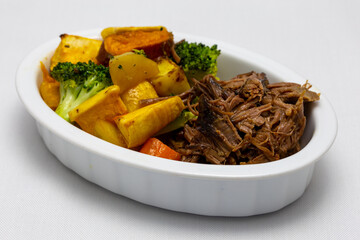 Butterflied beef with roasted vegetables