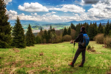 Hiking woman in forest. Beautiful view on region Liptov, Slovakia