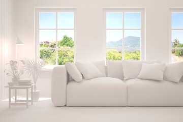 Mock up of stylish room in white color with sofa and green landscape in window. Scandinavian interior design. 3D illustration
