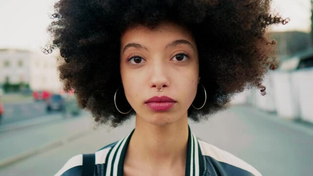 Portrait of beautiful woman looking at camera