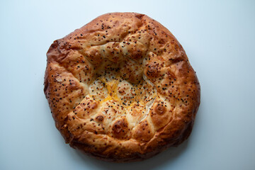 isolated photo of a traditional Turkish bread with sesame known as pide in Turkey