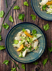 healthy and fresh artichoke salad with oranges and hazelnut