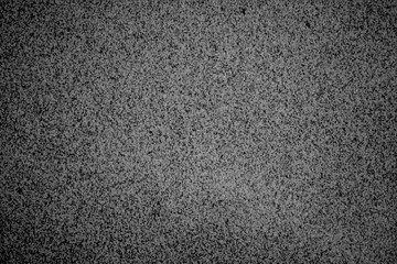 Obraz premium Stone granite wall background, black and white granite texture, architecture pattern, close up, copy space, front view