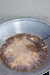 Frying food in hot oil