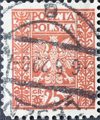 POLAND-CIRCA 1928 : A post stamp printed in Poland showing the heraldic animal of the eagle in the Coat of Arms of Poland.