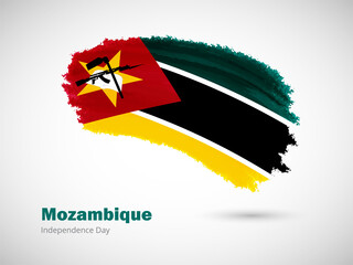 Happy independence day of Mozambique with artistic watercolor country flag background. Grunge brush flag illustration