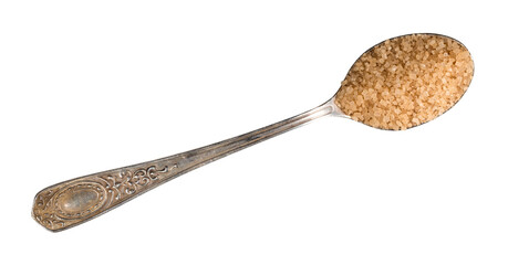 demerara brown sugar in silver teaspoon cutout