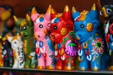 Peruvian handicrafts: Baked and hand painted ceramic ornaments, locally called  "Toritos of Pucara"