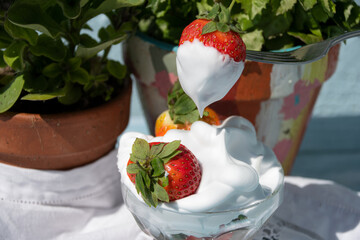 Strawberries and  cream  traditional  brattish summer food 
