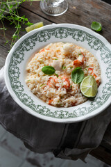 italian seafood risotto with shrimp and squid