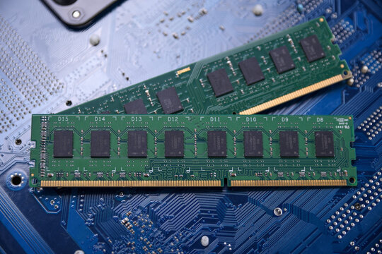 Computer memory RAM on motherboard background . Close up. system, main memory, random access memory, onboard, computer detail. Computer components . DDR3. DDR4. DDR5