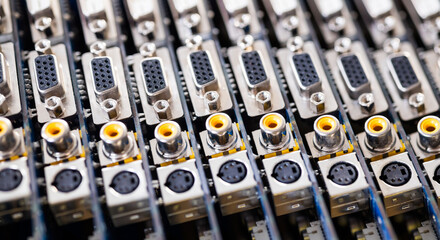 Close-up blurry metal sockets on a computer video board