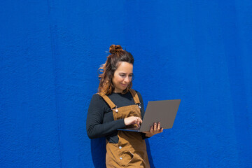 women laptop street blue