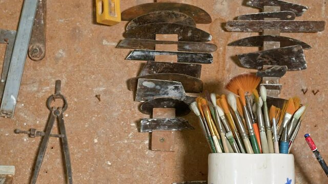 Brushes and Working Instruments in Ceramic Workshop Studio