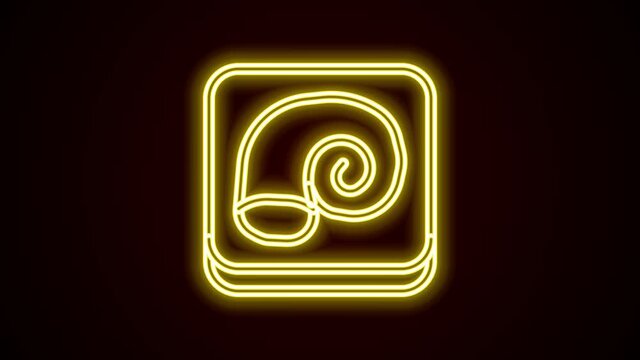 Glowing neon line Octopus on a plate icon isolated on black background. 4K Video motion graphic animation