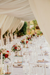 Set table at a wedding banquet in the park.