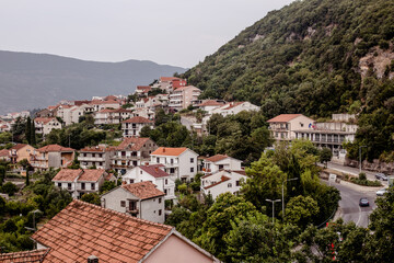 Fototapeta na wymiar View of Montenegrin houses with orange tiles