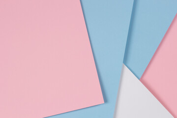 Abstract geometric pastel color paper texture background with light blue, pink and white colors