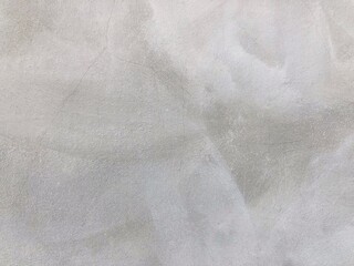 Modern raw grunge cement wall. Loft style of concrete house or building wall. Softness gray cement wall surface for background structure work.Polished cement wall.