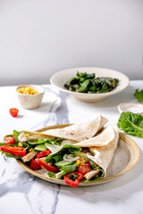 Traditional mexican tortila wrap with pork meat