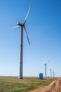 Wind turbines in the spring steppe. the picture was taken in Russia, in the Orenburg region