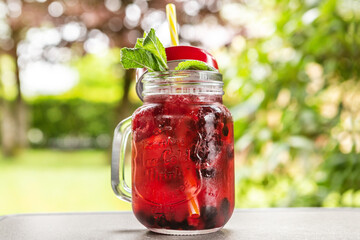 portrait of a fruity non-alcoholic summer drink, outdoors
