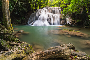 Fototapeta na wymiar Huay Mae Khamin Waterfall Waterfall paradise Travel all year at Kanchanaburi, a 7-tiered waterfall in a national park with hiking trails, famous waterfalls in Thailand.