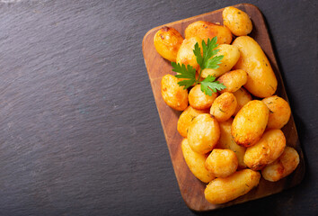 baked potatoes with parsley, top view